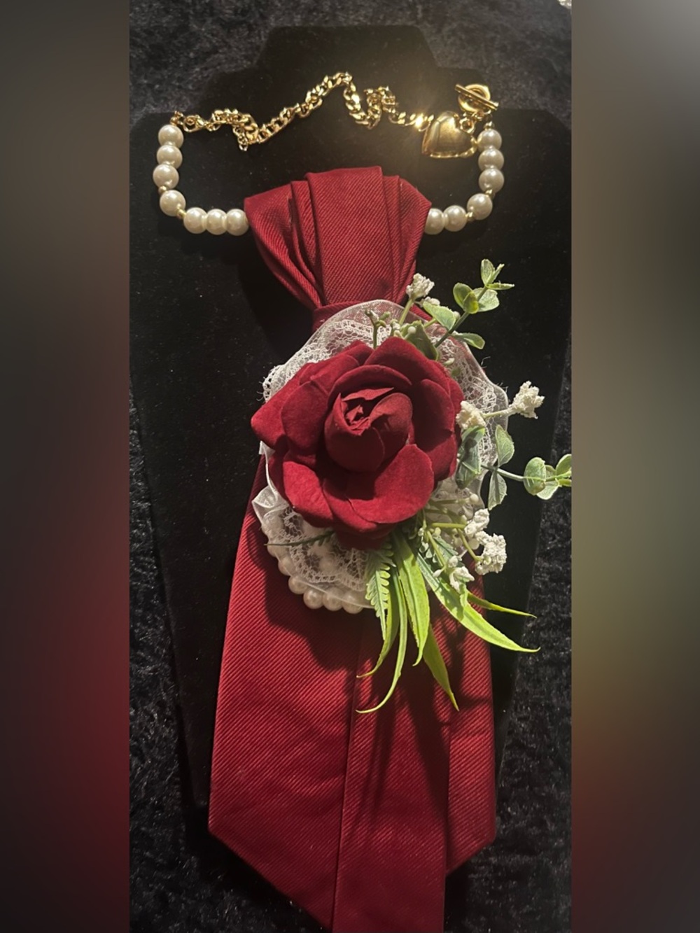 Burgundy tie with Rose Accessory and a Pearl Chain